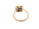 rear An early 20th century square cluster ring. Features a square inky black blue sapphire, 4x4mm (est 0.25 carats) mille grain set.