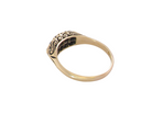 rear An eight stone boat shaped diamond ring, with two extra 'accent' diamonds to each end