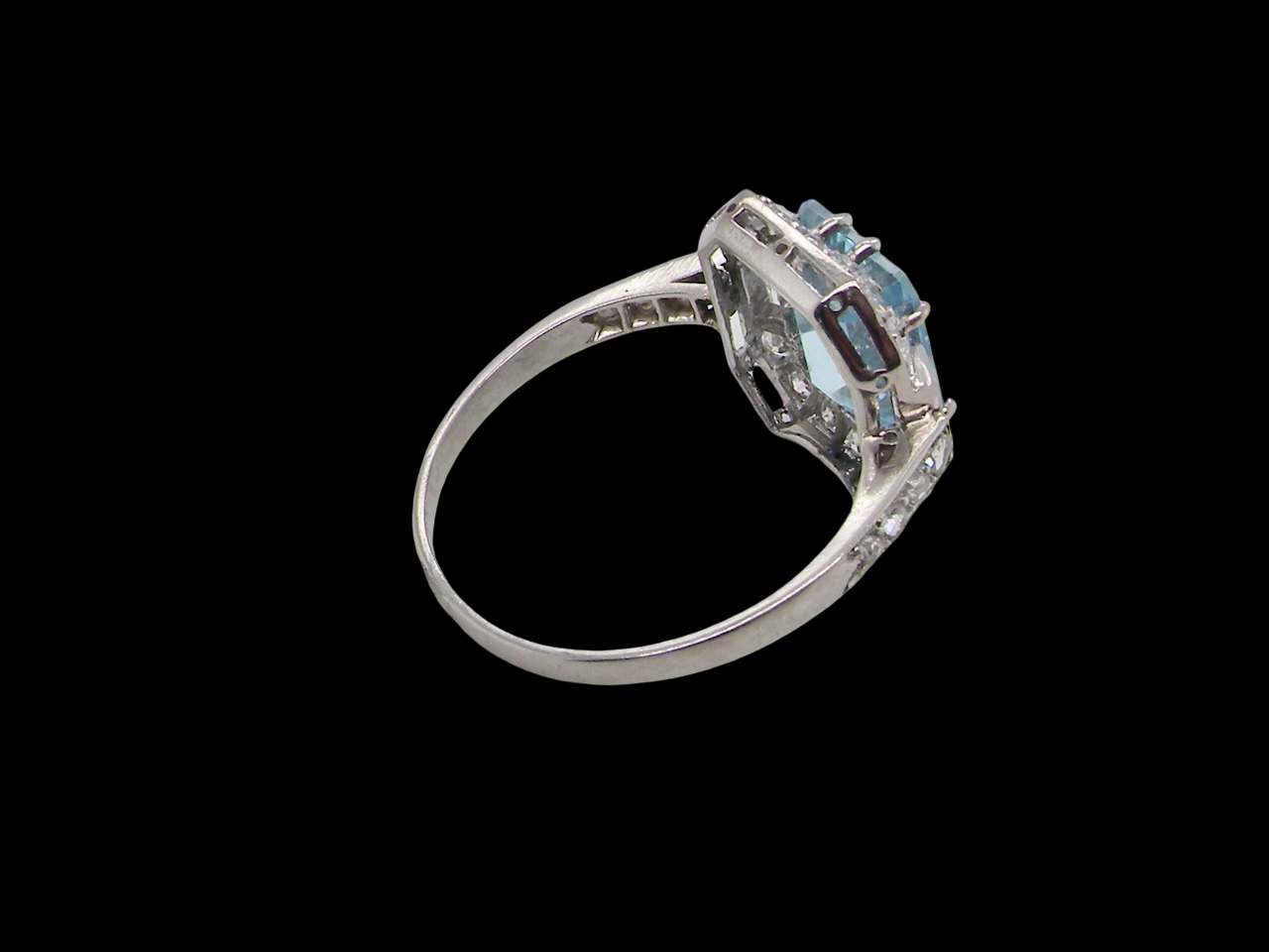 rear An elegant French Art Deco cluster ring in platinum (tests as), dating to circa 1930–1940 and bearing French control marks.