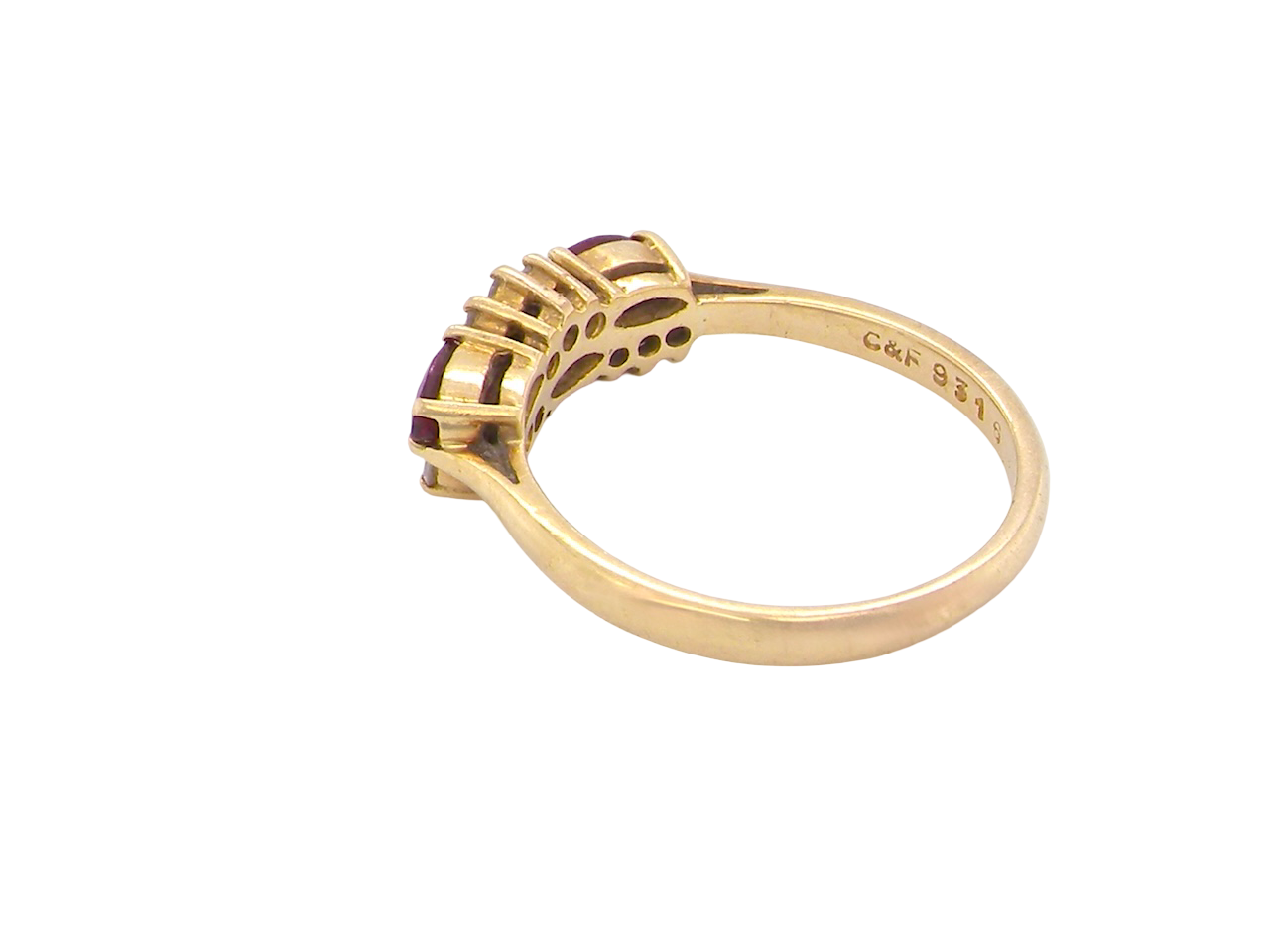 rear An unusual&nbsp; ring featuring three marquise-cut rubies (5×3 mm each).