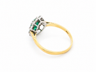 rear Features an oval cut emerald centre stone, vibrant green hues, measures 9x6mm(est 1.75 carats) . Complimented by an outer halo of ten 2.7mm brilliant cut white diamonds (est total 0.60 carats) colour i-j, clarity S.

