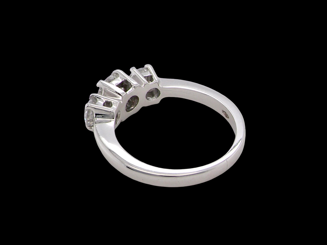 rear The diamond trilogy ring is one of the most iconic engagement ring styles. Its three prominent stones symbolise the past, present, and future of a relationship