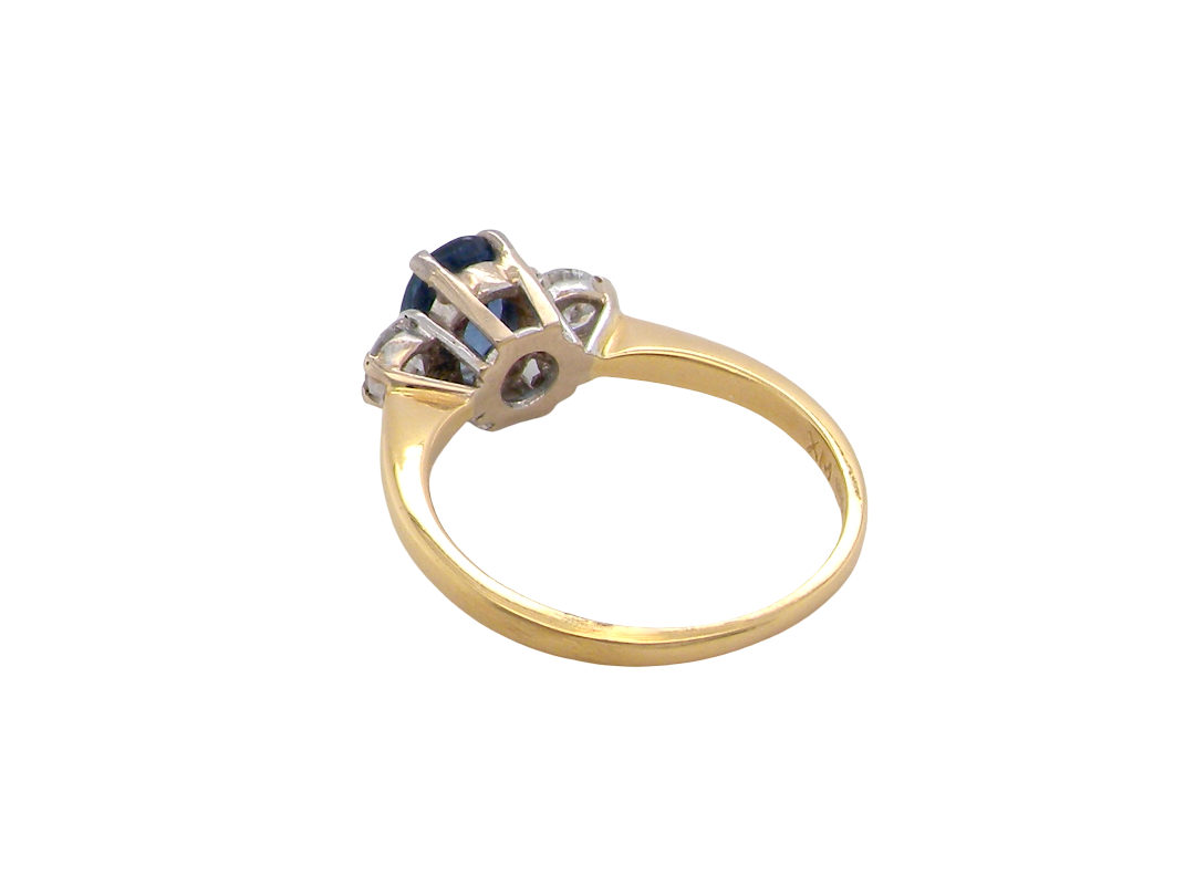 rear The iconic trilogy ring, featuring an oval cut sapphire centre stone, with a pleasing mid blue hue set into four claws, 7x5mm (0.75 carats est)