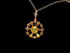 rear This exquisite piece features a&nbsp;6mm peridot at its centre, framed by a delicate border of fine seed pearls.