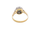 rear  beautiful cluster ring featuring a&nbsp;6mm round emerald 