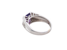 rear  beautiful dress ring crafted in 14ct white gold (stamped 585), featuring a stunning rectangular-cut Tanzanite measuring approximately 9 x 7.5mm, estimated at 2.5 carats. 