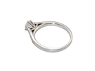 rear  beautiful platinum solitaire ring featuring a brilliant-cut white diamond, claw set, measuring 4.8mm and weighing approximately 0.65ct. Diamond graded I colour, SI1 clarity, with an 88-facet cut.
