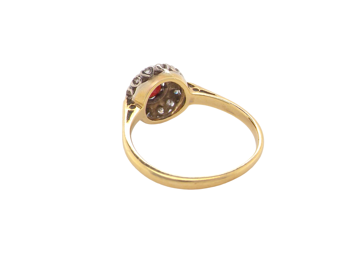 rear  classic 1960s 18 carat yellow gold cluster ring, featuring a round garnet 