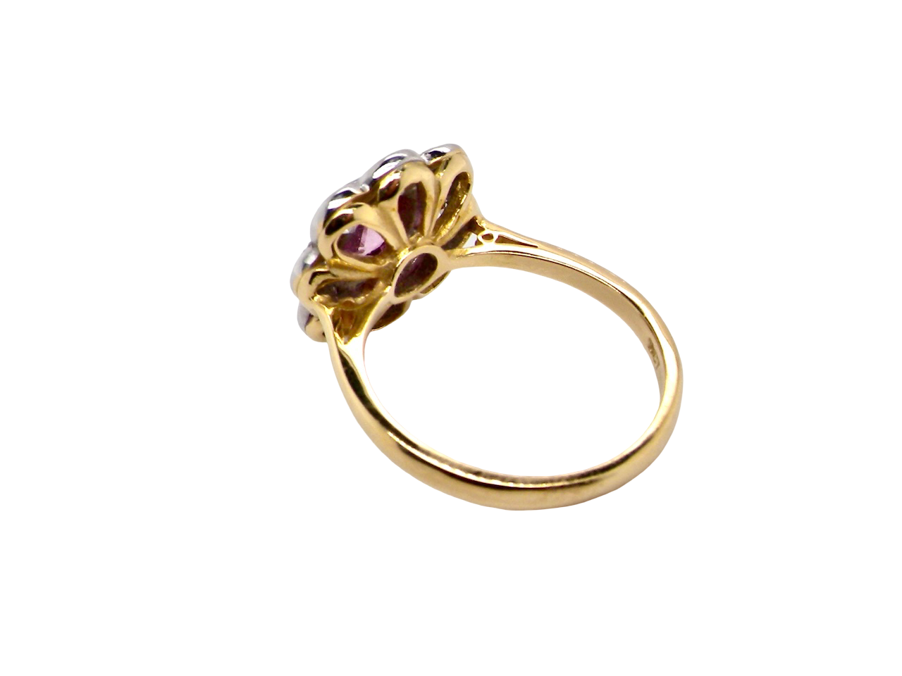 rear  cluster ring featuring a beautiful cushion-cut pink sapphire 