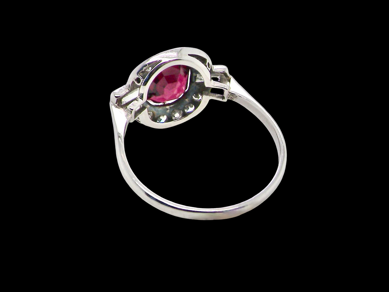 rear  fine Art Deco style cluster ring featuring an untreated natural ruby 