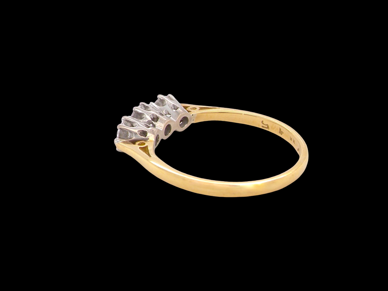 Vintage diamond trilogy engagement ring