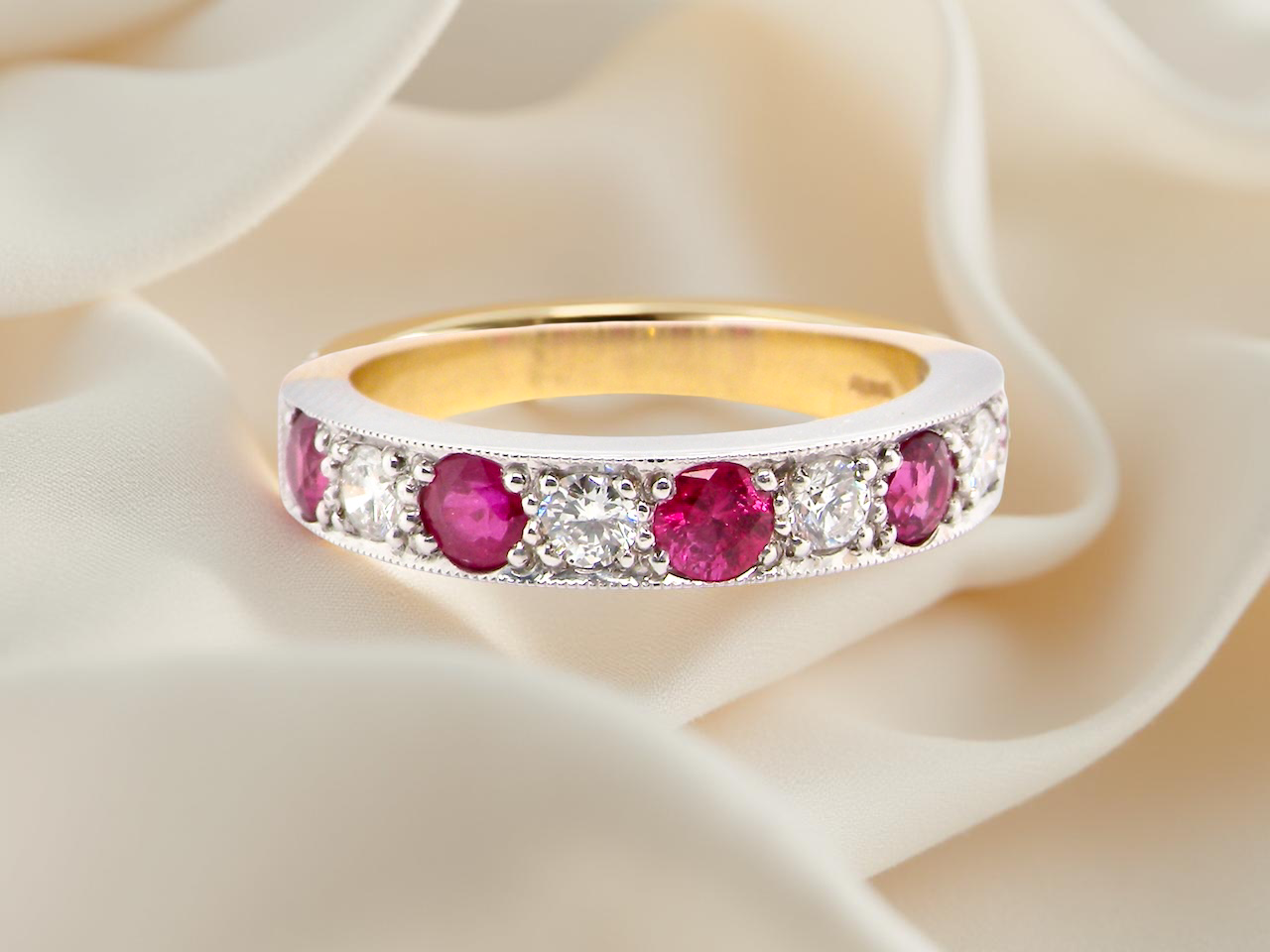 18 carat gold half-hoop eternity ring, 