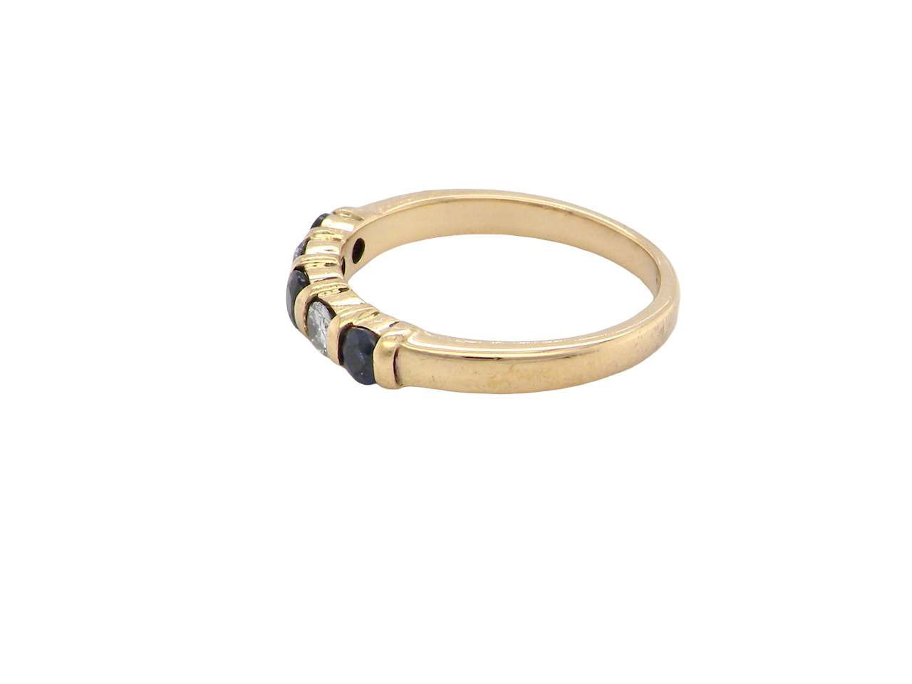 side 18-carat gold half-hoop eternity ring, set with&nbsp;three round mid-blue sapphires