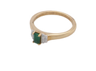 side A 9 carat gold ring that features a rectangular cut emerald, 5x3mm (est 0.30 carats)
