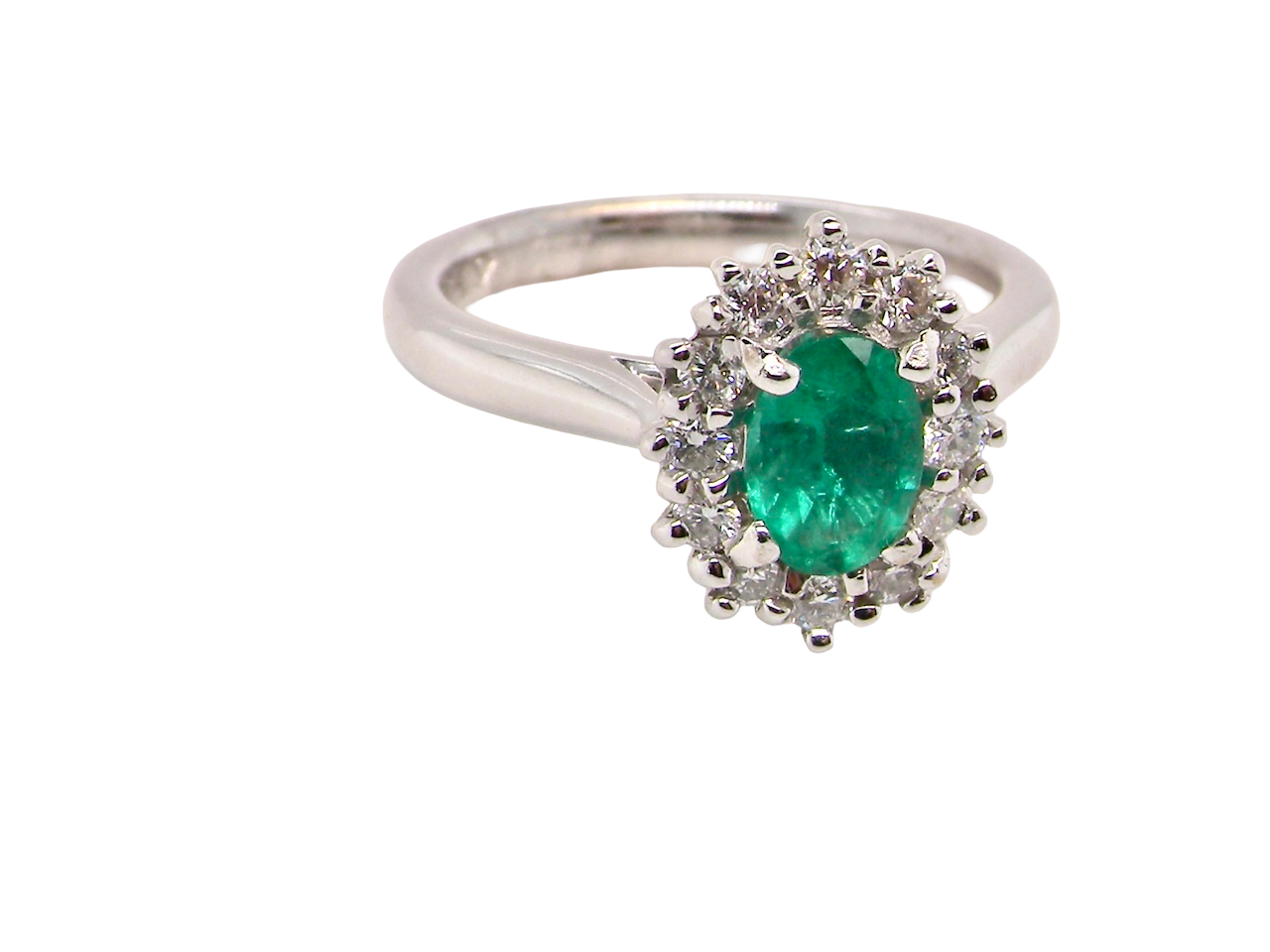 A NEW Emerald and Diamond ring