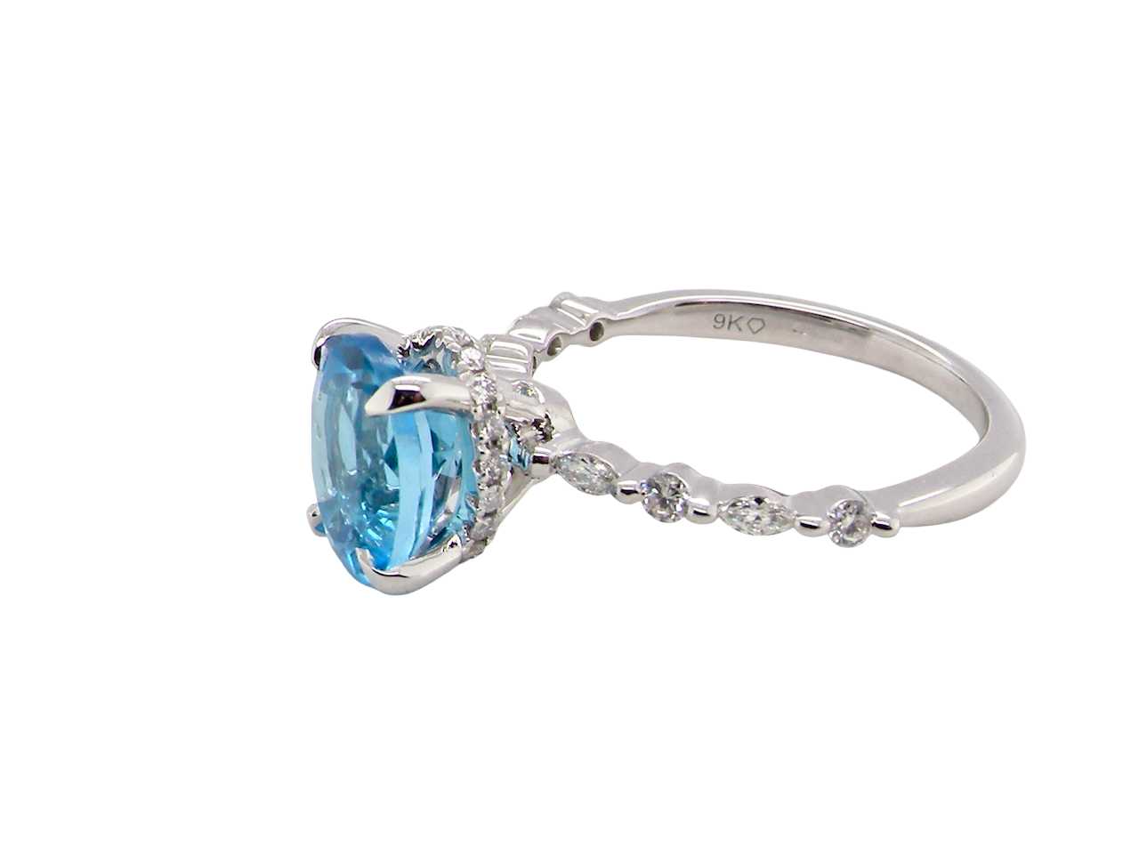 side A NEW ring- but with a gemstone that we have taken from an old ring that was worn out, so its a new lease of life!&nbsp; The topaz measures 9x7mm.