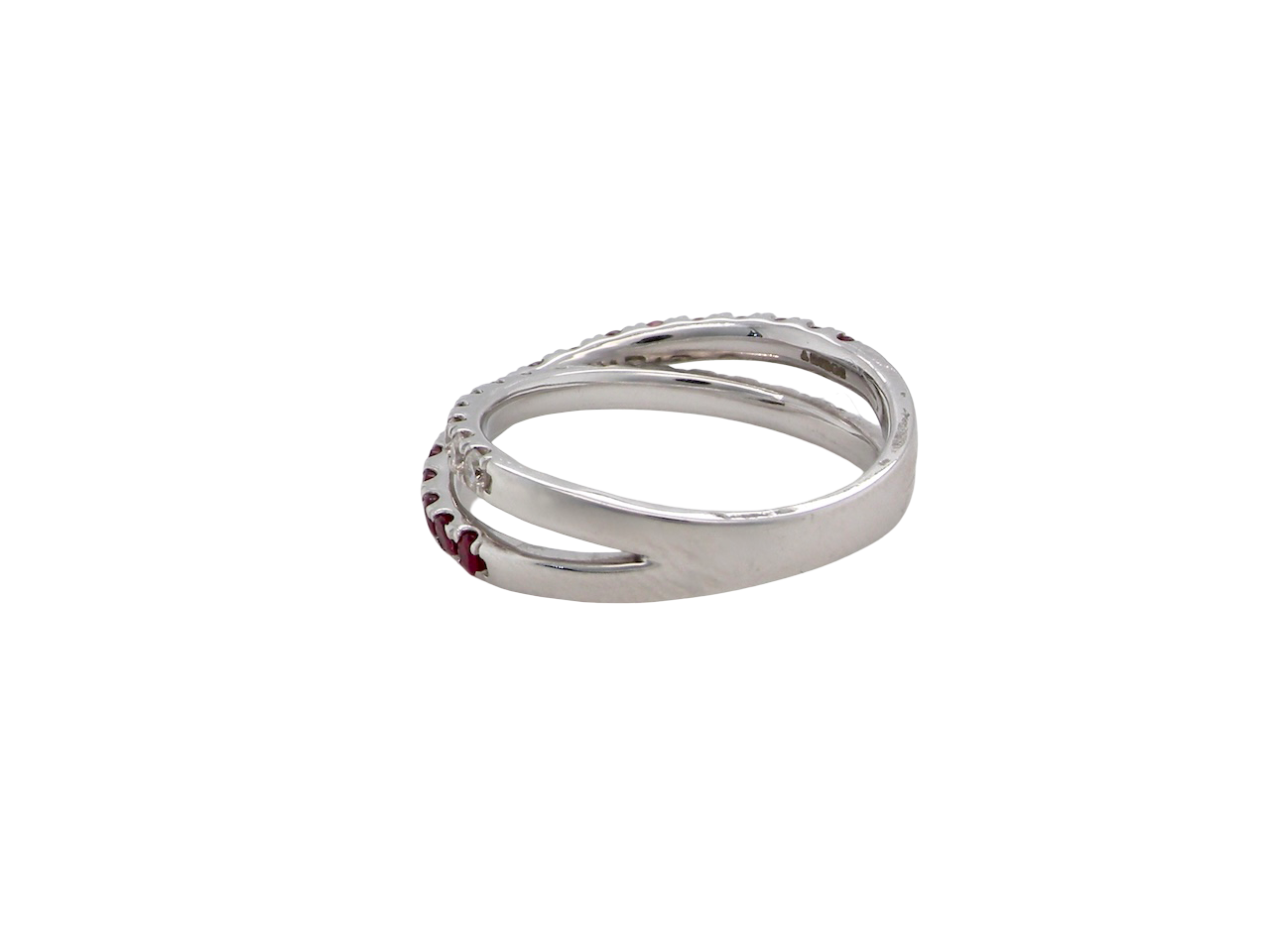 A NEW ruby and diamond cross over ring