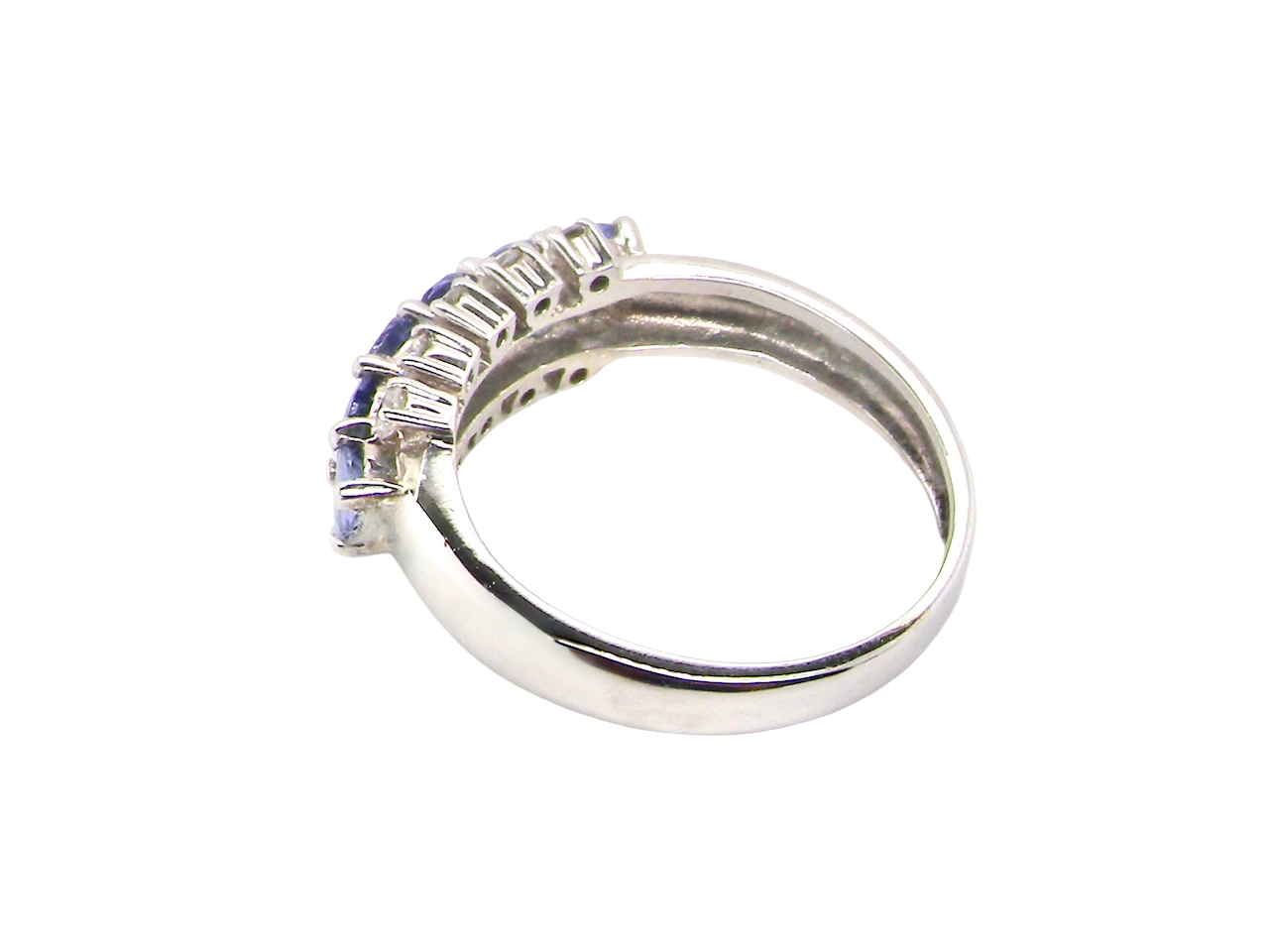 A Tanzanite and Diamond half hoop ring