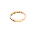 side A brand new half hoop eternity ring. Set with eight 1.3mm emeralds (total 0.12 carats) and interspaced with brilliant cut white diamonds, each 1.3mm (0.10 carats)