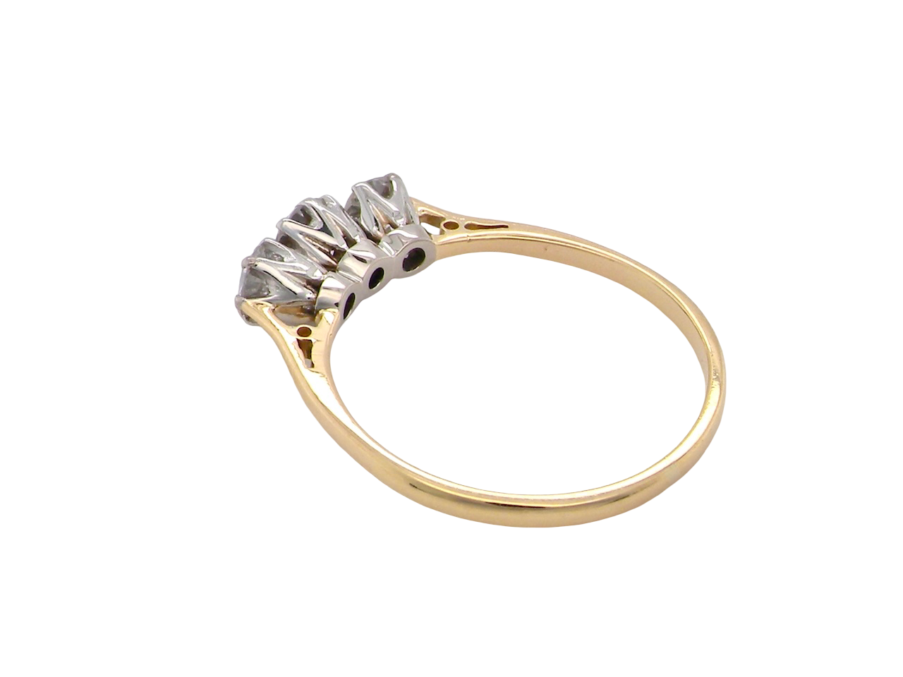 Gold ring with a diamond on a white background