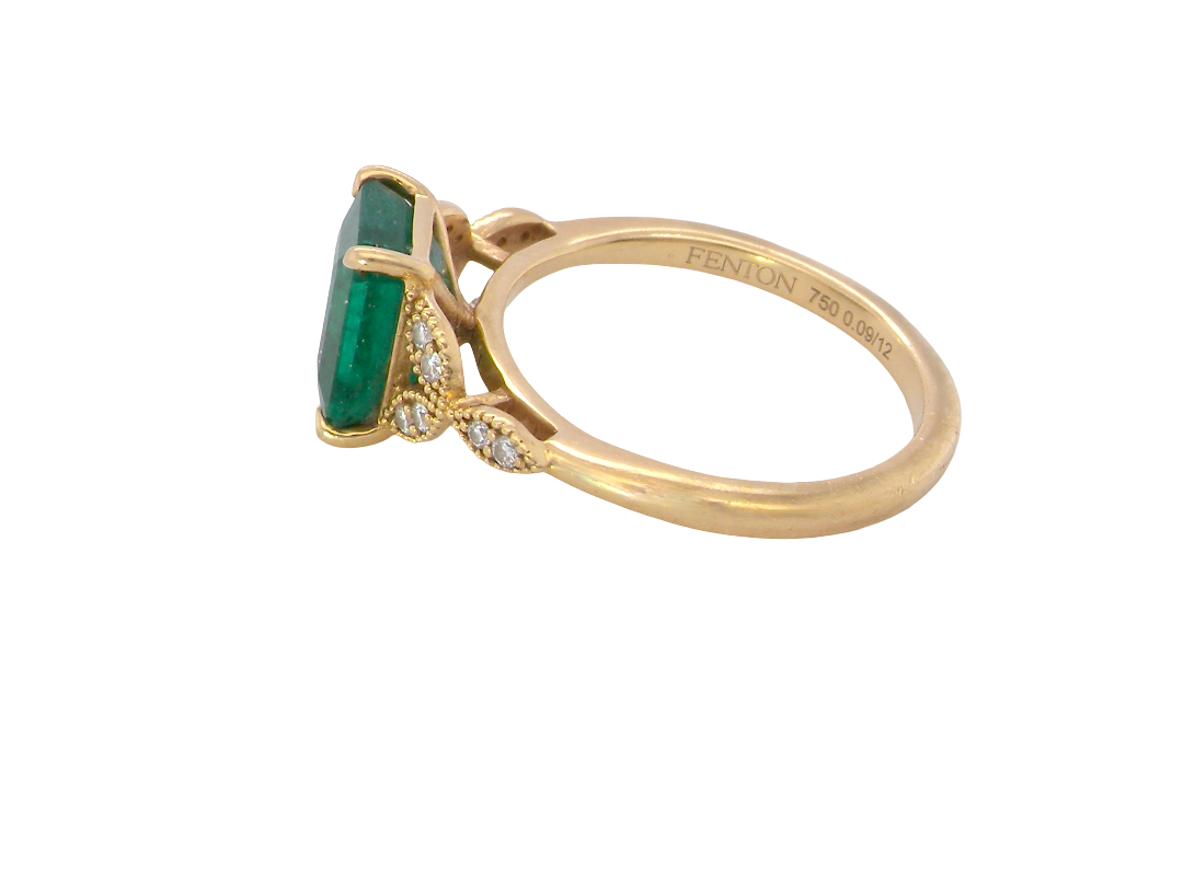 side A fabulous emerald and diamond ring from the House of Fenton, beautifully crafted in 18 carat gold.