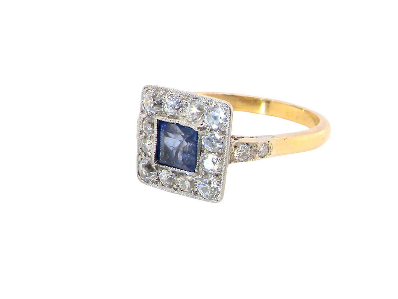 side A fine Art Deco cluster ring. The centre stone a square sapphire 5x5mm (est 0.50 carats) in a mille grain setting.
