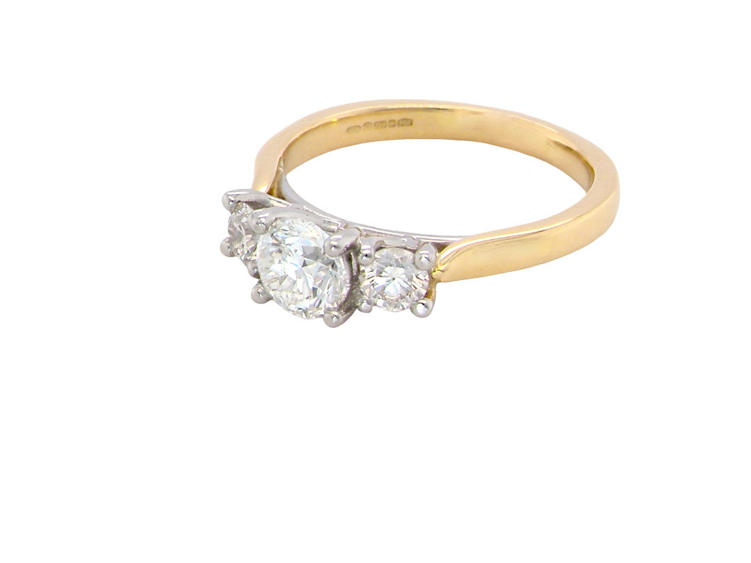 side A fine and impressive three stone diamond trilogy ring, beautifully set with three graduated brilliant cut white diamonds.