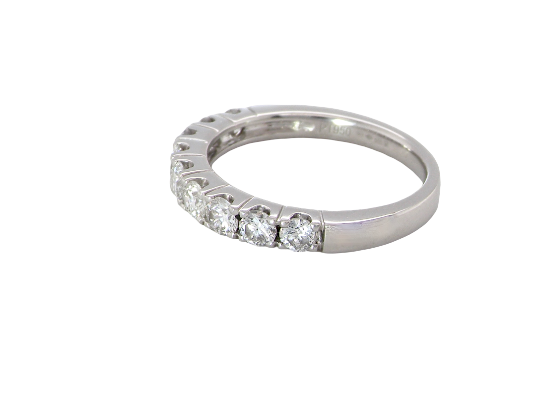 side A fine seven stone half hoop platinum eternity ring, total measures 0.70 carats