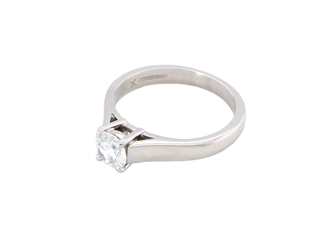 A fine solitaire ring, features an exceptional half carat diamond, brilliant cut, colour H-j, clarity VS2-Si1. Measures 5.2mm, depth 5.5mm, weight 4.9grams
