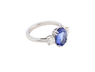 side A fine three stone trilogy ring. The centre stone a 4A tanzanite gem stone, measures 10x8mm (est 3 carats)&nbsp;