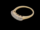 side A fine vintage ring set with five brilliant cut white diamonds.&nbsp;

Centre diamond 3.6mm (est 0.15 carats) 