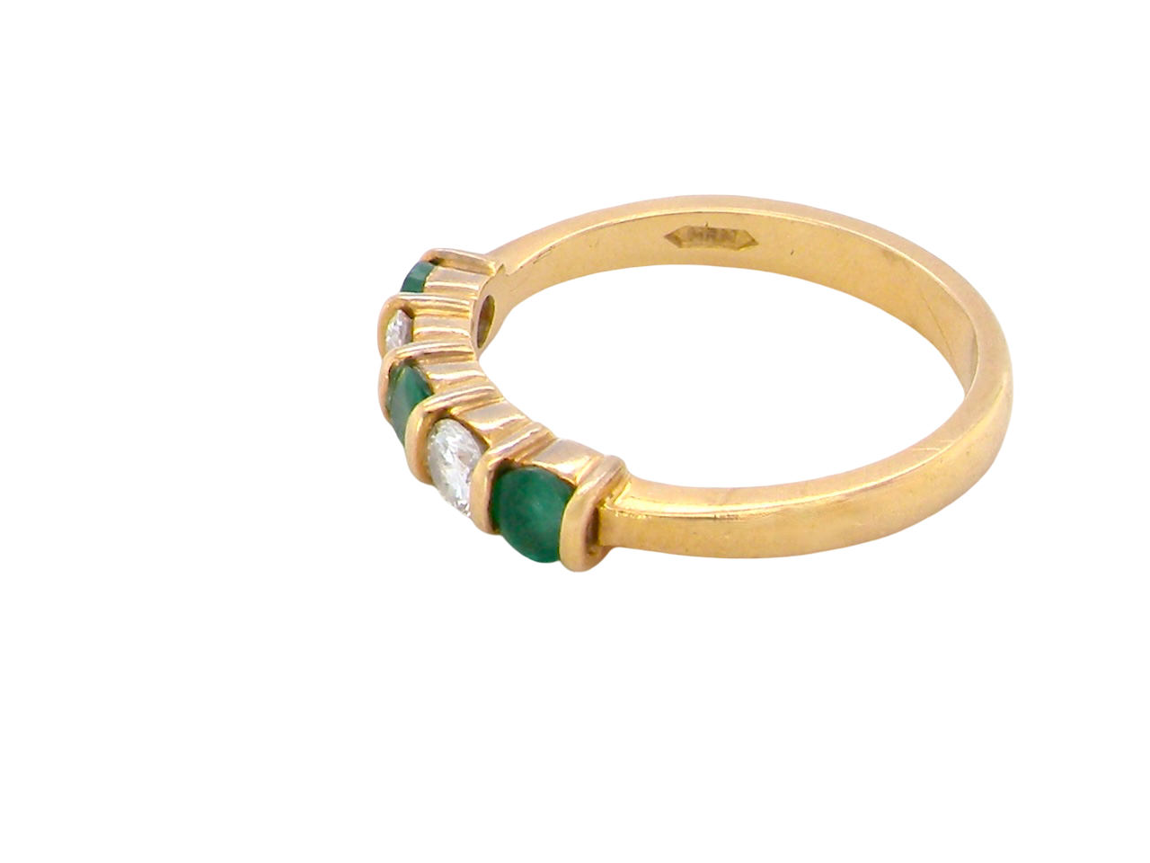 side A five stone ring set with three emeralds, each 3mm diameter.

Between each two brilliant cut white diamonds, each 3.4mm (0.15 carats each est), colour i-j, clarity Si.

