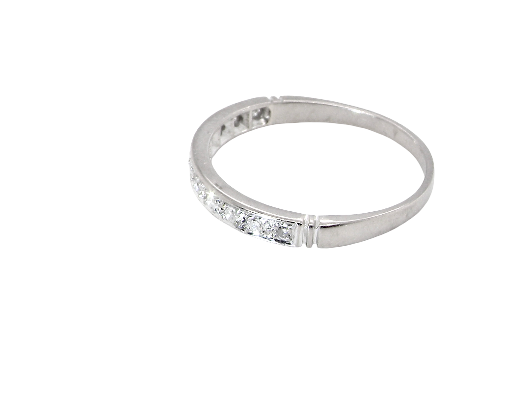 side A half hoop eternity ring. Set with eleven small white diamonds, brilliant cut 2mm each (total est 0.33 carats) colour i-k, clarity Si.