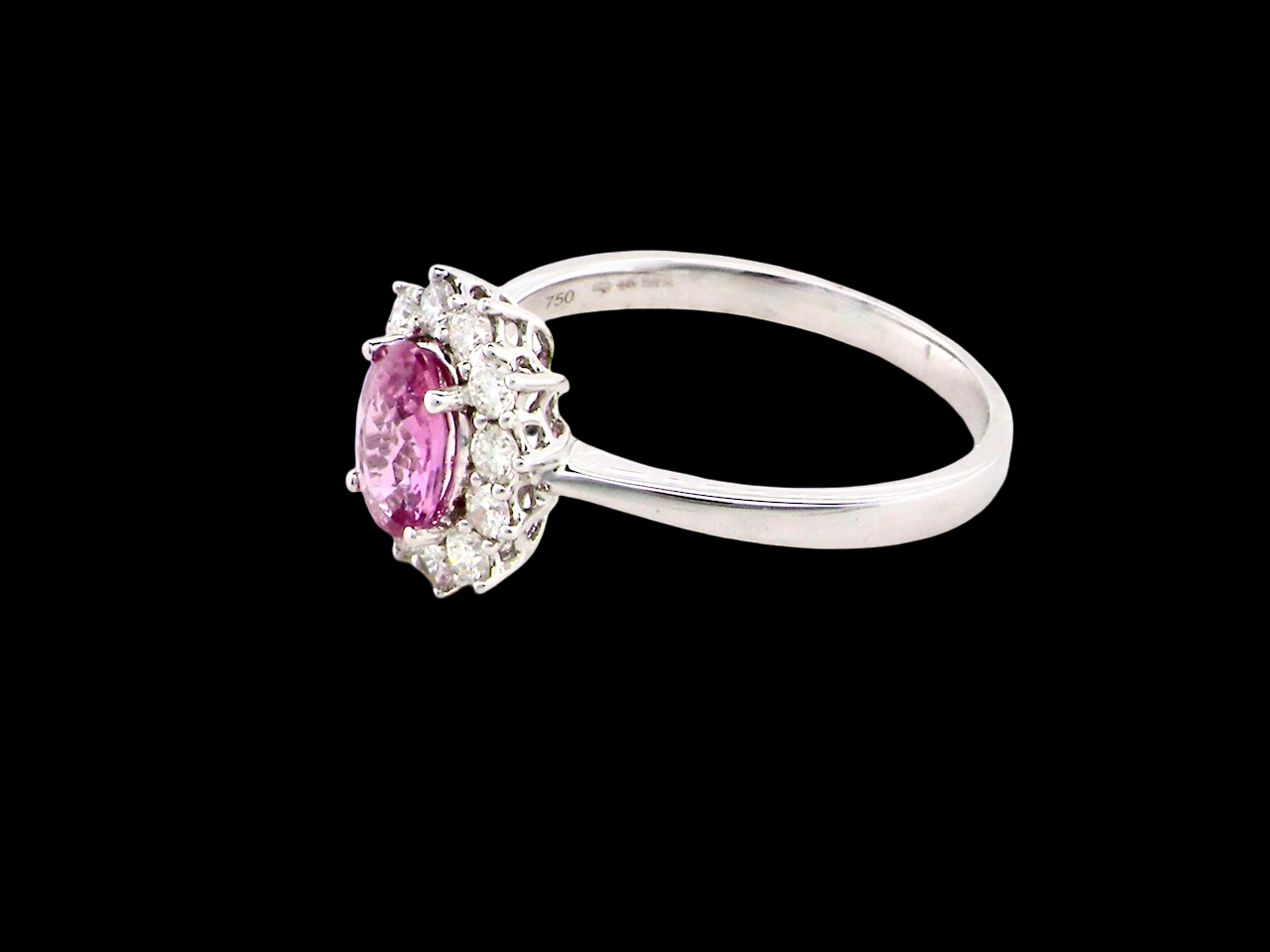 A modern Pink Sapphire and Diamond Ring