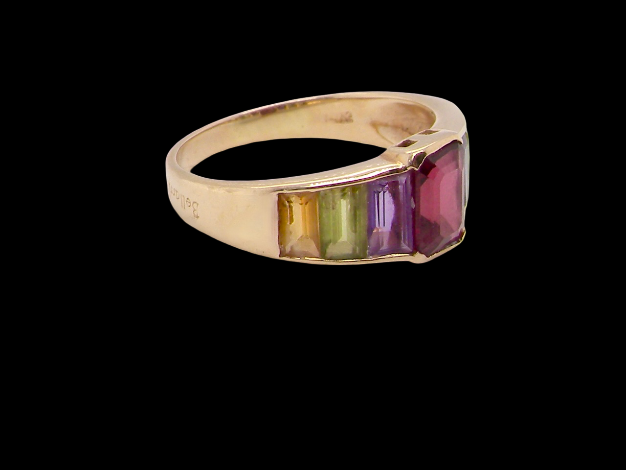 A multi gemstone dress ring