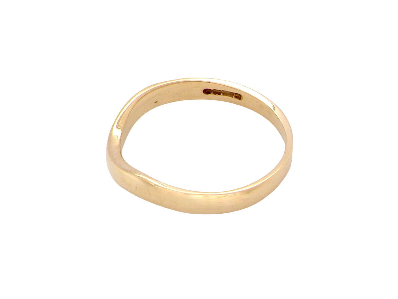 side A narrow 18 carat yellow gold wedding ring. This has a U shape which makes the placing of a cluster or even a solitaire engagement ring that much easier to place against as it will sit with the 'U'
