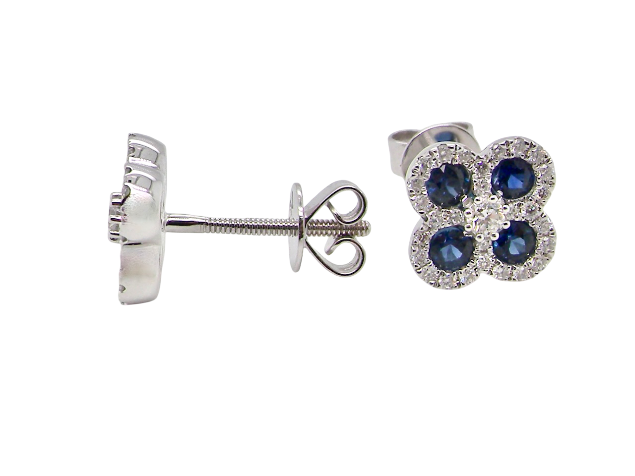 Silver earrings with blue gemstones on a white background