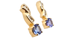 A pair of Tanzanite & Diamond Drop Earrings side view