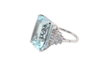 side A spectacular vintage statement ring, centred with an impressive rectangular-cut aquamarine of exceptional proportions. Measuring approximately&nbsp;18 x 13mm with a depth of 11mm, the aquamarine is estimated to weigh around 18 carats 