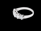 side A stunning half hoop ring featuring five exceptional brilliant-cut white diamonds, expertly claw set in 18ct white gold.

The centre diamond measures approximately 5.8mm (estimated 0.70 carats), flanked by a 5.0mm diamond on each side, with 4.5mm diamonds at each end. 