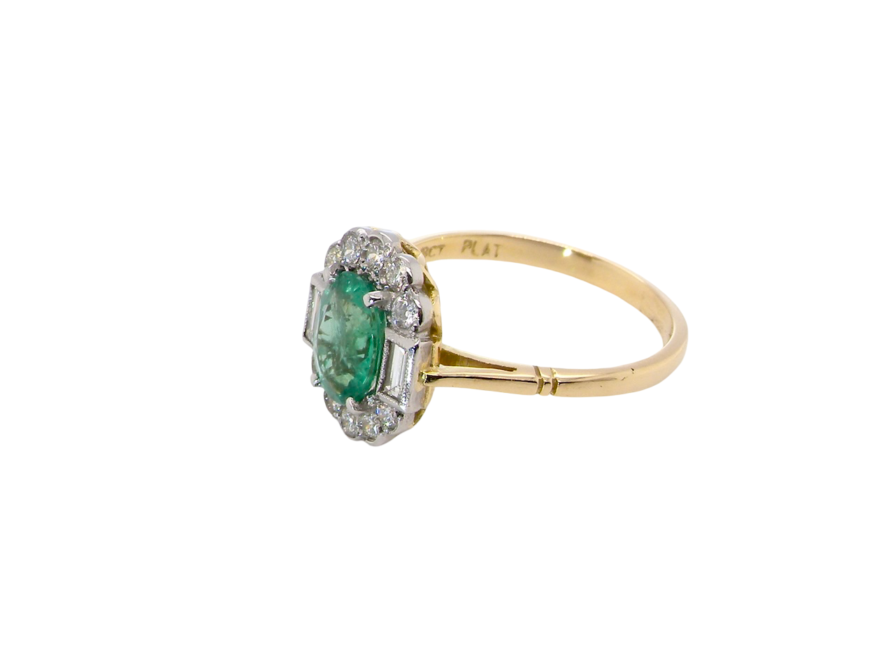 side A stunning vintage cluster ring, set with an oval-cut emerald measuring 8 x 6mm, approximately 1.10 carats. The emerald displays a rich, deep grass-green colour with natural inclusions, typical of a genuine stone.