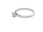 side A timeless and elegant solitaire ring set with a brilliant-cut white diamond