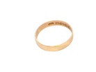 side A traditional 18 carat gold wedding ring.

A flat to a slight D shape profile, width 3.6mm. Weight 2.2grams.
