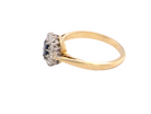 side A traditional 1970s cluster ring featuring a&nbsp;rectangular-cut sapphire,