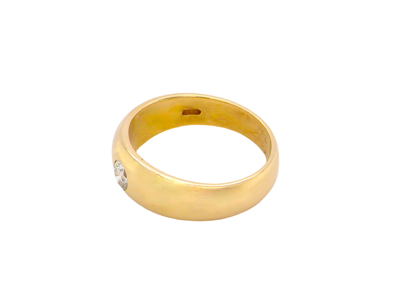 side A very heavy and substantial 18 carat gold gentleman’s ring, weighing just over 12 grams.