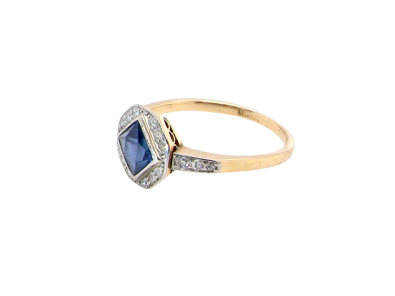 side A very pretty Art Deco cluster ring. To the centre a mid to dark blue sapphire, square cut but set as a 'diamond shape'. Measures 5x5mm, rim setting.