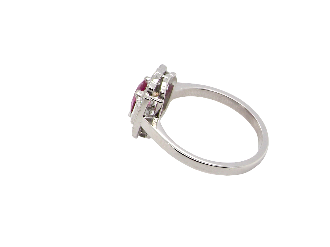 side A very pretty ring that features an oval cut pink sapphire, 6x4mm (est 0.50 carats).&nbsp;