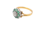 side A vintage 1960s cluster ring. Principal stone a brilliant cut white diamond, 0.45 carats (5mm diameter)&nbsp;