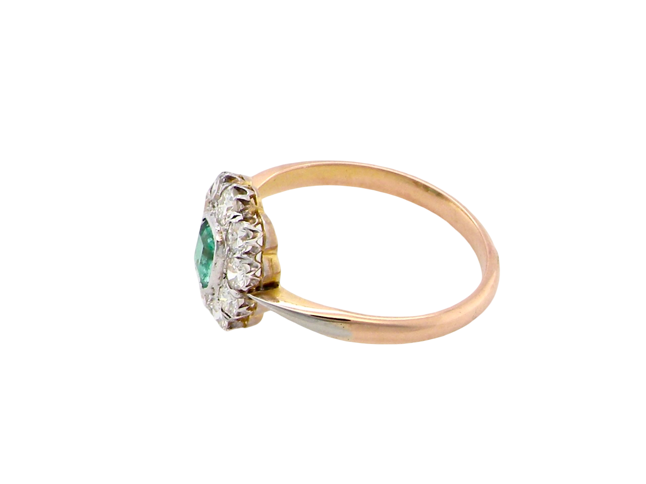 side A vintage cluster ring, the centre stone a cushion shaped emerald 4x3.5mm, mid to dark green colour. Mille grain setting.
