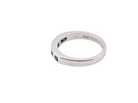 side An 18 carat white gold half hoop eternity ring. Set with princess cut white diamonds, total of four- estimated 0.40 carats (2.4mm each) colour H-j, clarity Si.